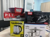 Электрический чайник, утюг, набор кастрюль ждут своих хозяев в редакции Буинской районной газеты